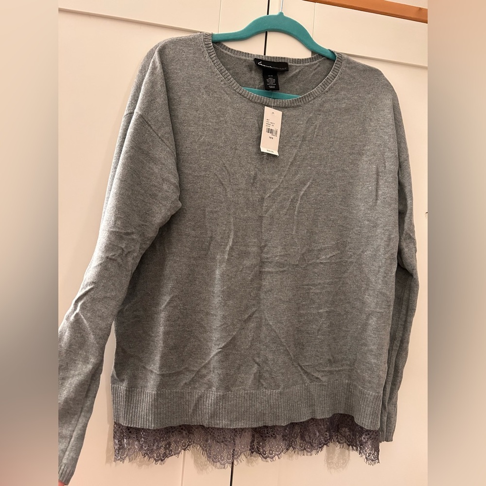 Lane Bryant grey 14/16 sweater with lace bottom. Never worn with tags.